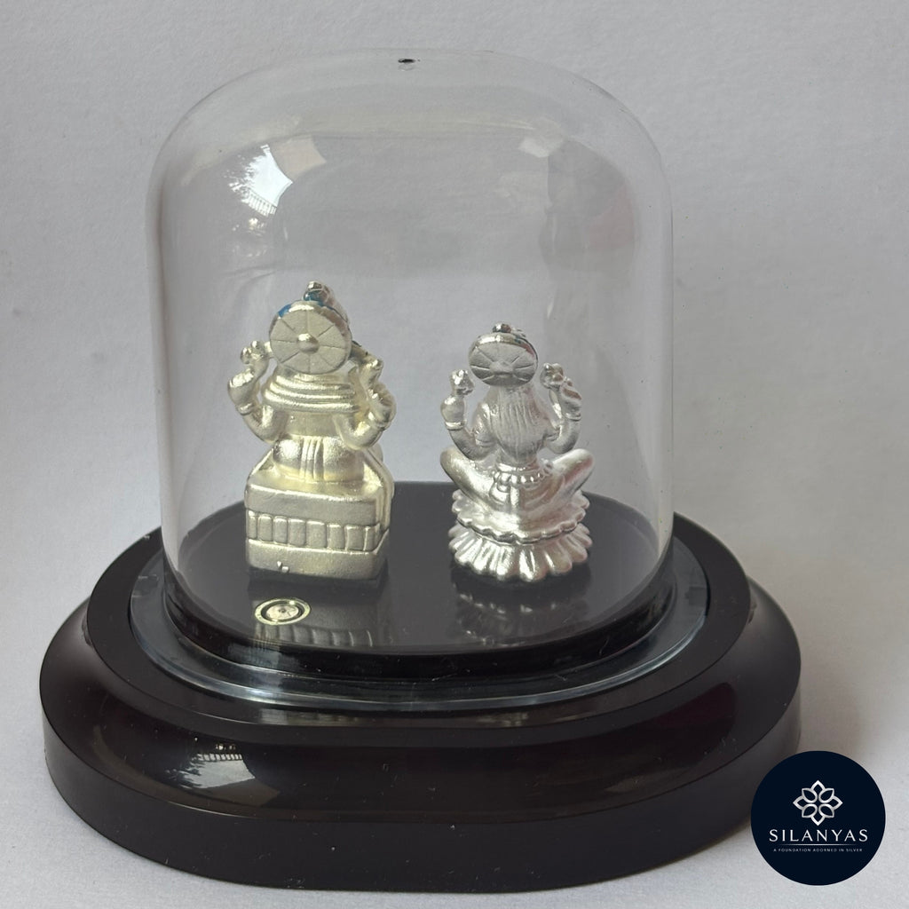 Shubh Lakshmi Ganesh 3D Idol – 999 Silver with Transparent Dome....