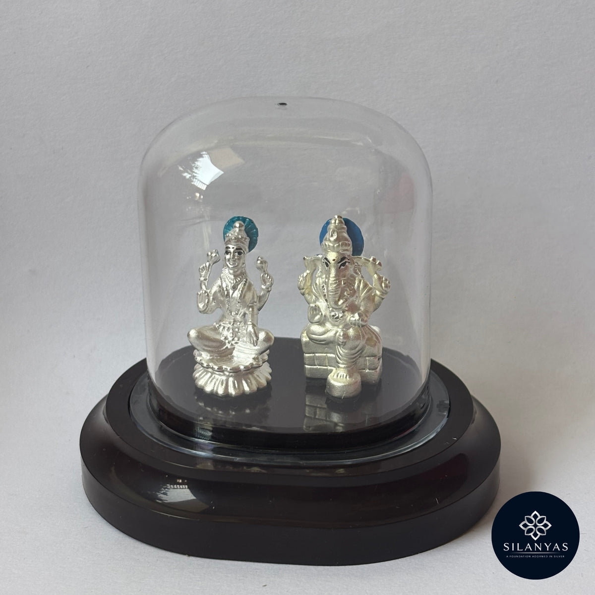 Shubh Lakshmi Ganesh 3D Idol – 999 Silver with Transparent Dome....